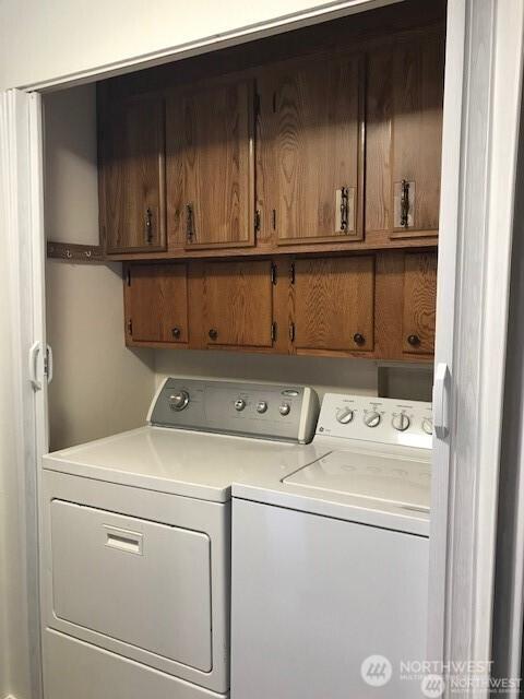 240 Parkwood Blvd, Sequim, WA 98382 - washroom with cabinet space and washing machine and clothes dryer