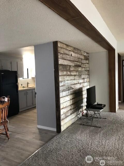 240 Parkwood Blvd, Sequim, WA 98382 - living room featuring a textured ceiling and wood finished floors