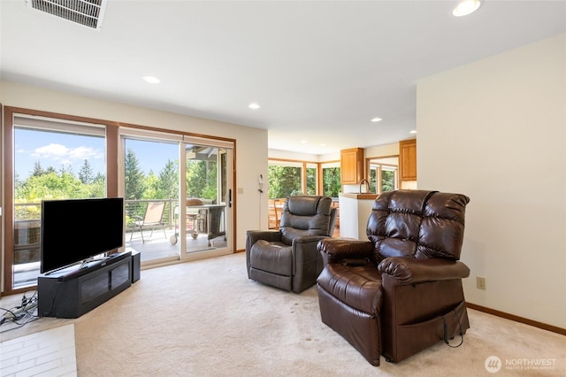 14320 2nd Ave NE, Marysville, WA 98271 - living room featuring recessed lighting and light colored carpet