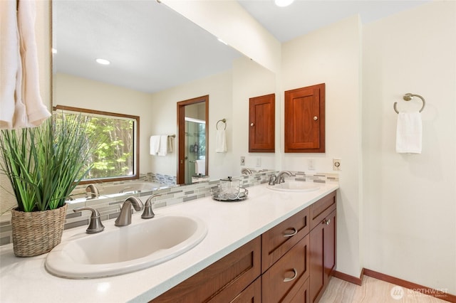14320 2nd Ave NE, Marysville, WA 98271 - bathroom with double vanity, a bath, and a shower stall