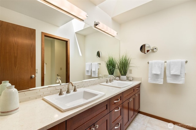 14320 2nd Ave NE, Marysville, WA 98271 - full bath featuring double vanity, tile patterned flooring, and baseboards