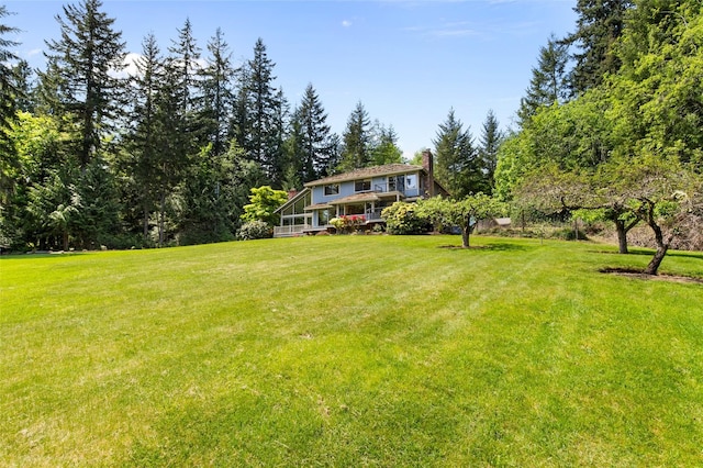 14320 2nd Ave NE, Marysville, WA 98271 - view of grassy yard featuring a sunroom