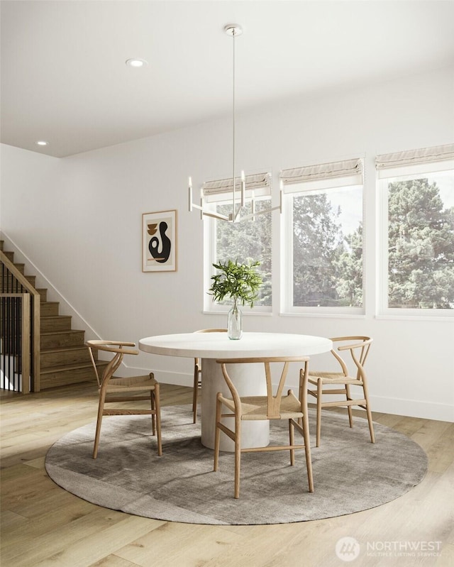 7506 18th Ave NW, Seattle, WA 98117 - dining area with baseboards, recessed lighting, wood finished floors, and stairway