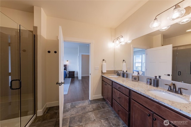 1602 Latitude Cir, Anacortes, WA 98221 - bathroom with double vanity, baseboards, and a shower stall