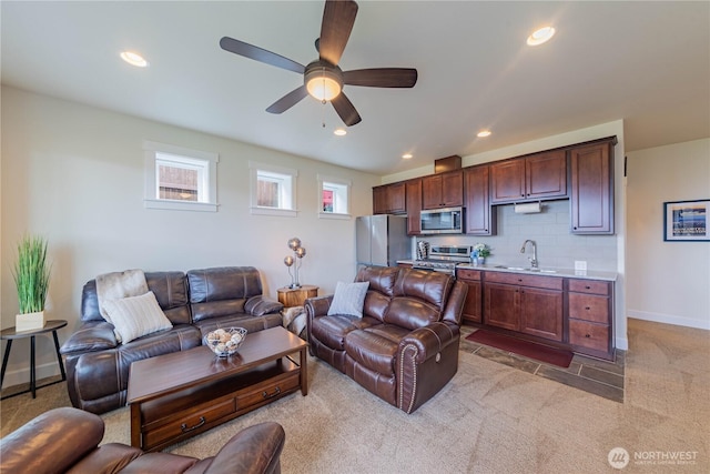 1602 Latitude Cir, Anacortes, WA 98221 - living area with light colored carpet, ceiling fan, baseboards, and recessed lighting