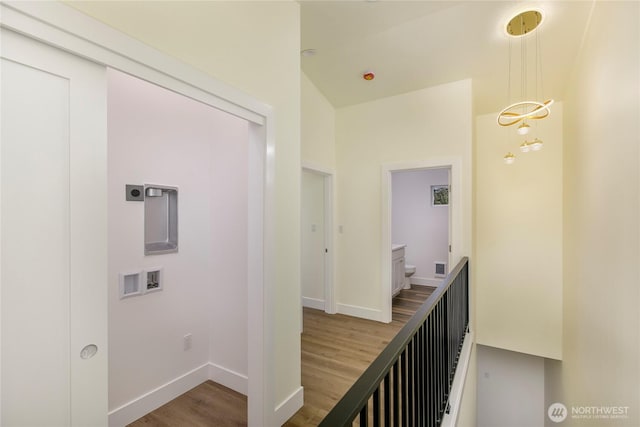 9253 6th Ave NW, Seattle, WA 98117 - corridor with baseboards, visible vents, and wood finished floors