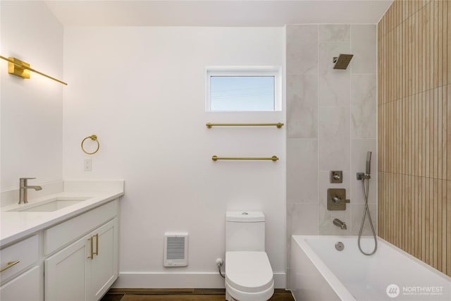 9253 6th Ave NW, Seattle, WA 98117 - full bath with vanity, heating unit, toilet, baseboards, and shower / bathing tub combination