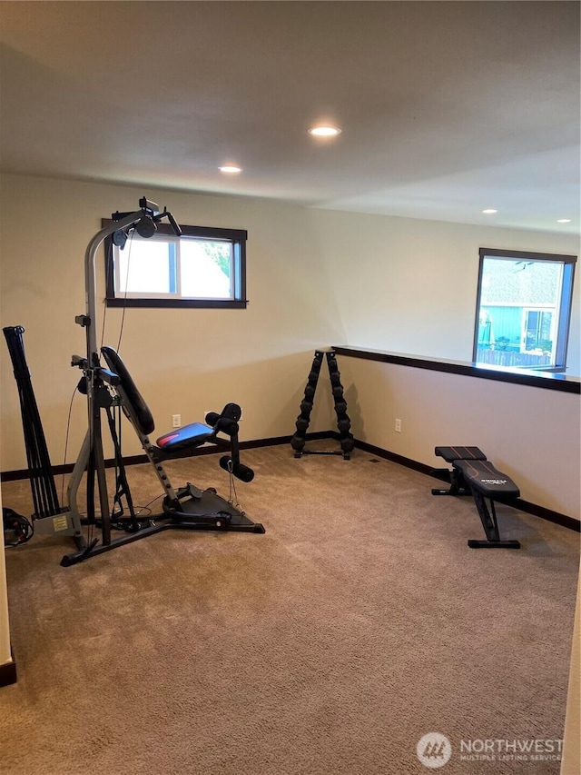 workout area featuring baseboards, carpet flooring, and recessed lighting