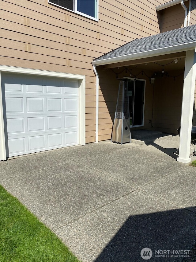 garage with driveway