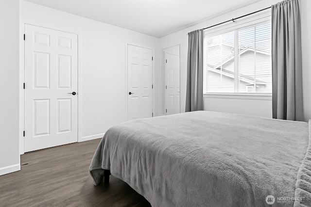 2709 Maplewood Ave Unit 304, Bellingham, WA 98225 - bedroom with dark wood-style flooring and baseboards