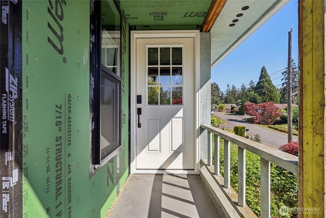 property entrance with a porch