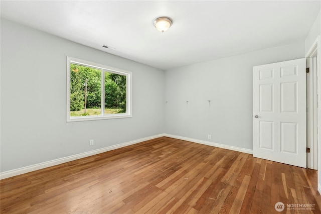 24005 SE 132nd Way, Issaquah, WA 98027 - unfurnished room with hardwood / wood-style floors and baseboards