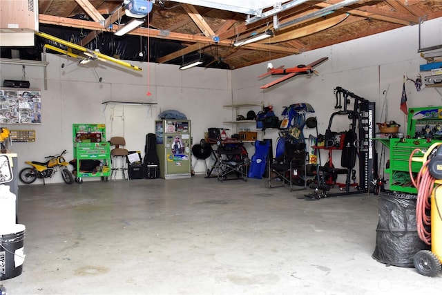 garage with a workshop area