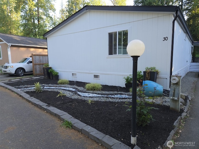 31101 116th Ave SE Unit 30, Auburn, WA 98092 - view of side of home featuring crawl space