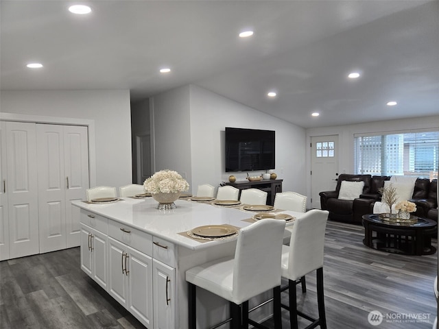 31101 116th Ave SE Unit 30, Auburn, WA 98092 - kitchen featuring dark wood finished floors, open floor plan, a kitchen island, white cabinets, and recessed lighting