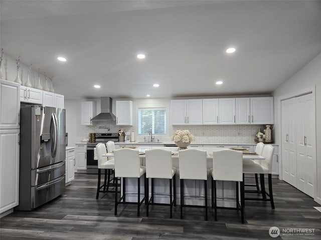 31101 116th Ave SE Unit 30, Auburn, WA 98092 - kitchen featuring appliances with stainless steel finishes, wall chimney exhaust hood, a sink, dark wood-style flooring, and recessed lighting