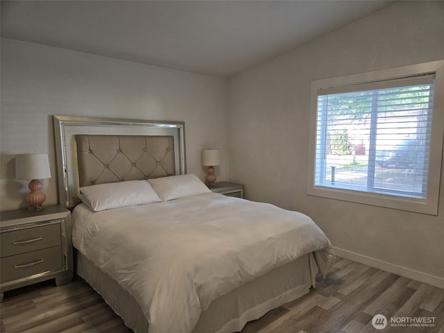 31101 116th Ave SE Unit 30, Auburn, WA 98092 - bedroom featuring wood finished floors, baseboards, and lofted ceiling