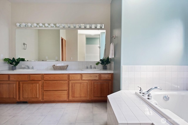 1491 Olympic Heights Ln, Freeland, WA 98249 - full bath with a bath, double vanity, a sink, and tile patterned flooring