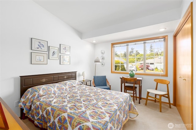carpeted bedroom with recessed lighting