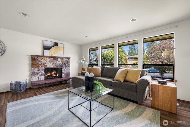 11815 77th Ave S, Seattle, WA 98178 - living room featuring wood finished floors, a fireplace, recessed lighting, and baseboards