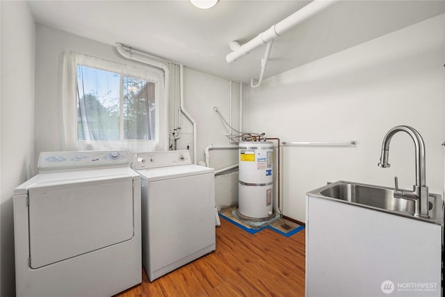 11815 77th Ave S, Seattle, WA 98178 - laundry area featuring water heater, independent washer and dryer, and light wood finished floors