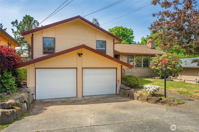 11815 77th Ave S, Seattle, WA 98178 - split level home with driveway, a chimney, and an attached garage