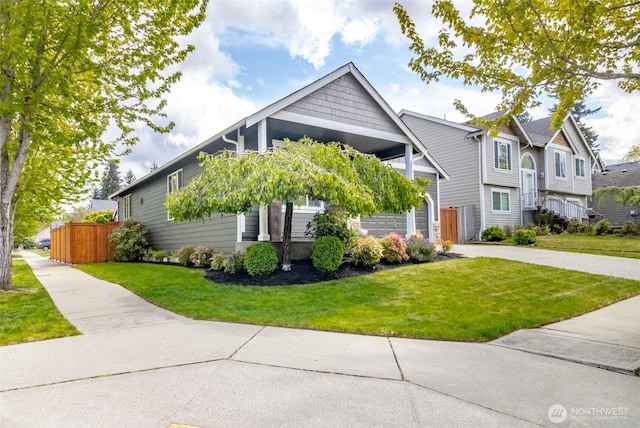 craftsman-style home with concrete driveway