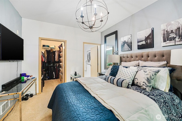 825 Harrington Pl SE Unit 2145, Renton, WA 98058 - carpeted bedroom with a chandelier, a walk in closet, a closet, and ensuite bath