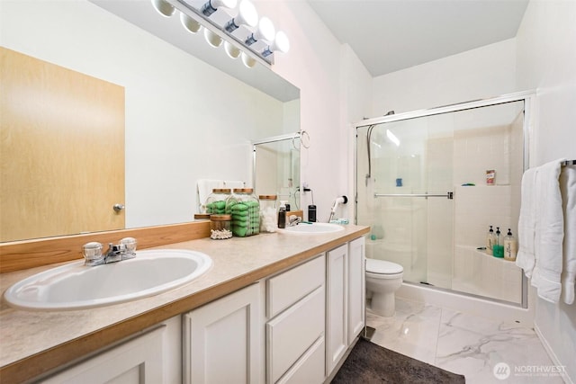 825 Harrington Pl SE Unit 2145, Renton, WA 98058 - full bath with marble look tile flooring, a stall shower, double vanity, and toilet
