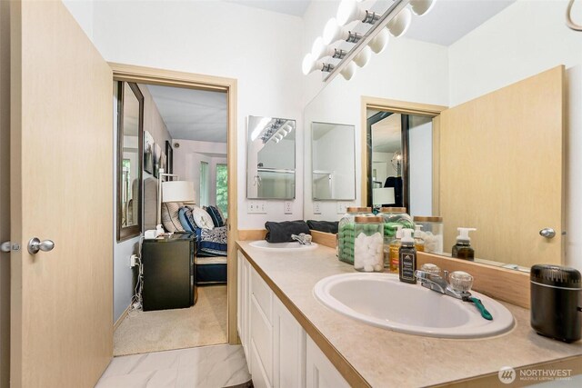 825 Harrington Pl SE Unit 2145, Renton, WA 98058 - full bathroom featuring ensuite bath, double vanity, and marble look tile flooring