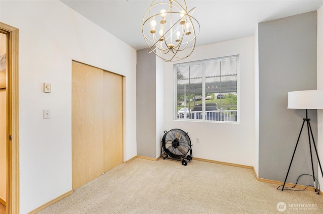 825 Harrington Pl SE Unit 2145, Renton, WA 98058 - unfurnished dining area featuring a chandelier, carpet flooring, and baseboards