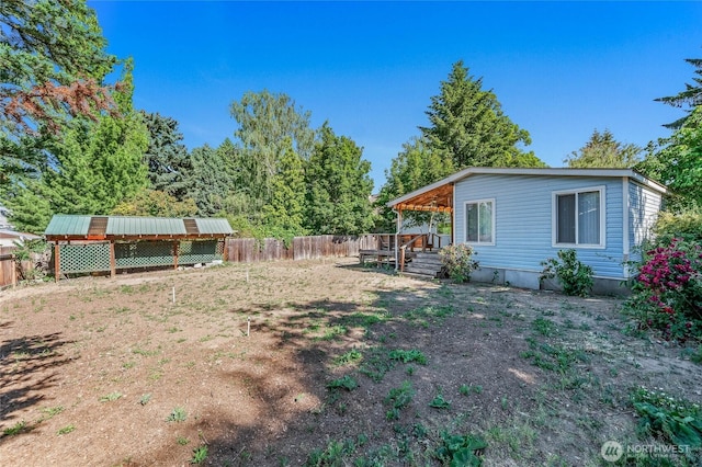 1332 Orchard Ave, Wenatchee, WA 98801 - fenced backyard featuring a wooden deck