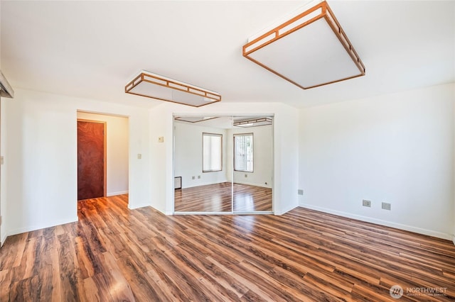1332 Orchard Ave, Wenatchee, WA 98801 - spare room featuring wood finished floors, attic access, and baseboards