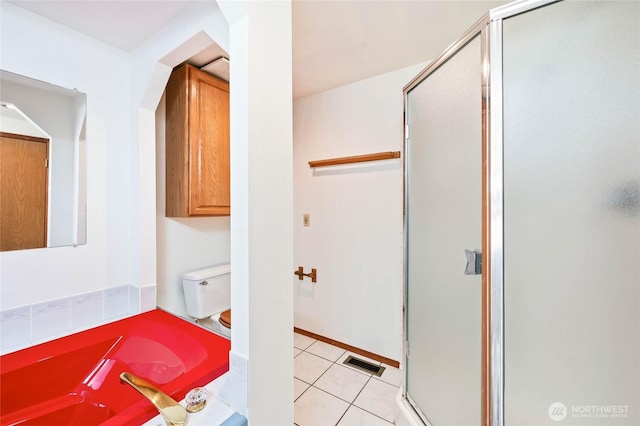 1332 Orchard Ave, Wenatchee, WA 98801 - full bath featuring a stall shower, toilet, a garden tub, and tile patterned floors