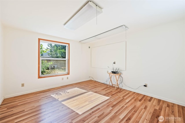 1332 Orchard Ave, Wenatchee, WA 98801 - unfurnished room with wood finished floors and baseboards
