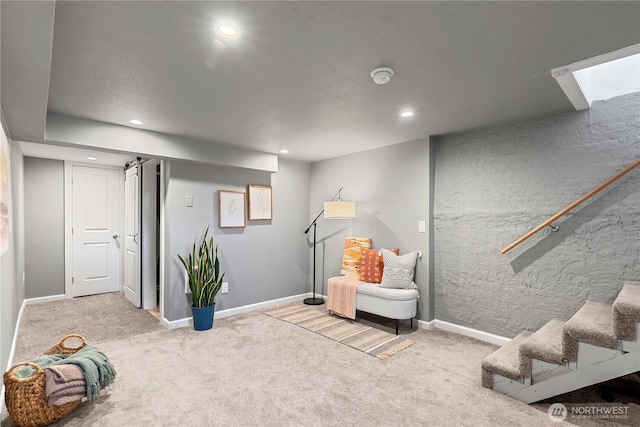 sitting room featuring recessed lighting, carpet flooring, stairs, and baseboards