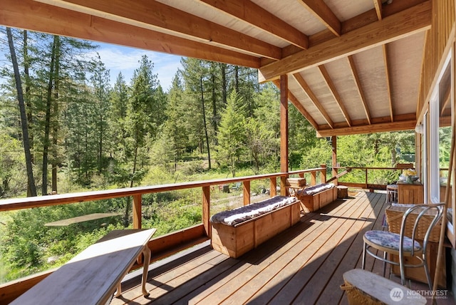 deck with a forest view