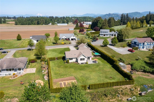 aerial view with a mountain view and a rural view