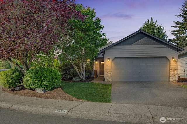 18711 22nd Dr SE, Bothell, WA 98012 - view of front of property featuring stone siding, concrete driveway, and an attached garage