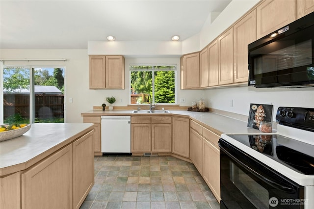 18711 22nd Dr SE, Bothell, WA 98012 - kitchen with black appliances, a sink, light brown cabinets, and recessed lighting