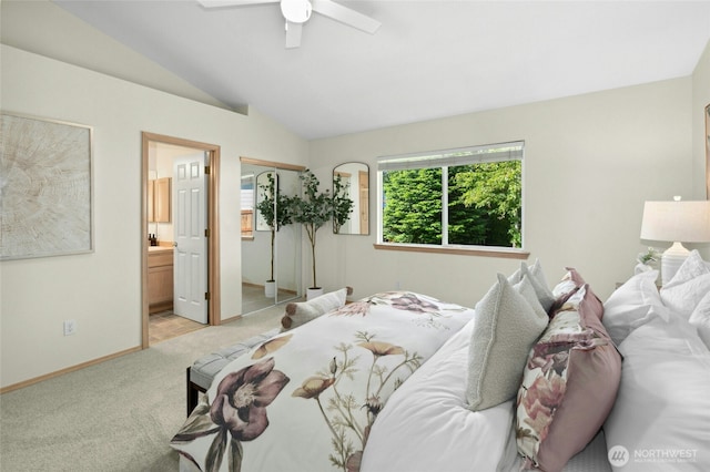 18711 22nd Dr SE, Bothell, WA 98012 - bedroom featuring vaulted ceiling, light colored carpet, baseboards, ensuite bathroom, and a ceiling fan