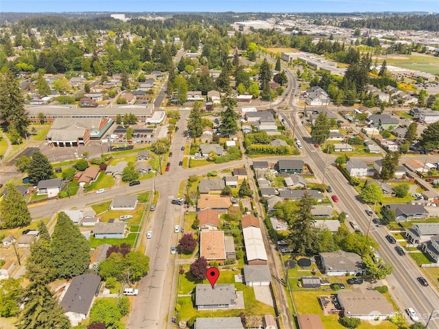 aerial overview of property's location with nearby suburban area