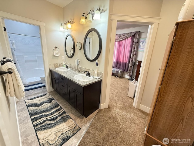1755 E Madera St, Othello, WA 99344 - bathroom featuring double vanity, a sink, toilet, and a shower stall