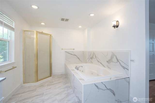 bathroom featuring baseboards, a stall shower, a tub with jets, recessed lighting, and marble finish floors