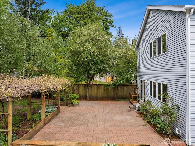 view of patio / terrace with fence