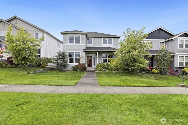18709 138th Street Ct E, Bonney Lake, WA 98391 - view of front facade with a front yard and roof with shingles