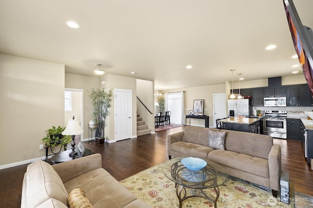18709 138th Street Ct E, Bonney Lake, WA 98391 - living area featuring stairs, dark wood-style flooring, recessed lighting, and baseboards