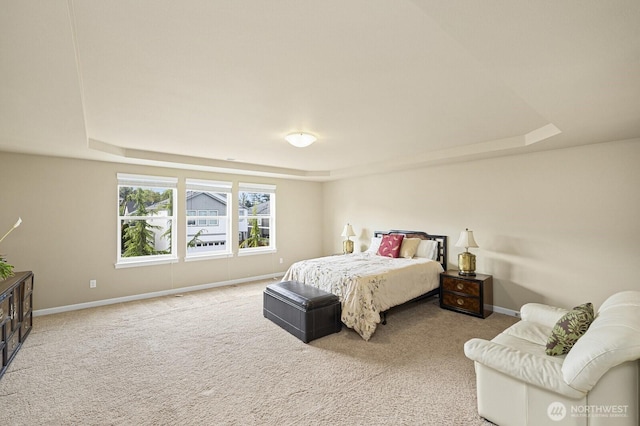 18709 138th Street Ct E, Bonney Lake, WA 98391 - bedroom with a raised ceiling, baseboards, and carpet