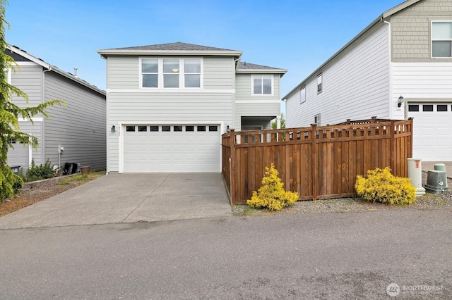 18709 138th Street Ct E, Bonney Lake, WA 98391 - traditional home featuring a garage, fence, concrete driveway, roof with shingles, and central AC