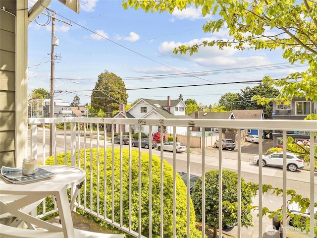 balcony featuring a residential view